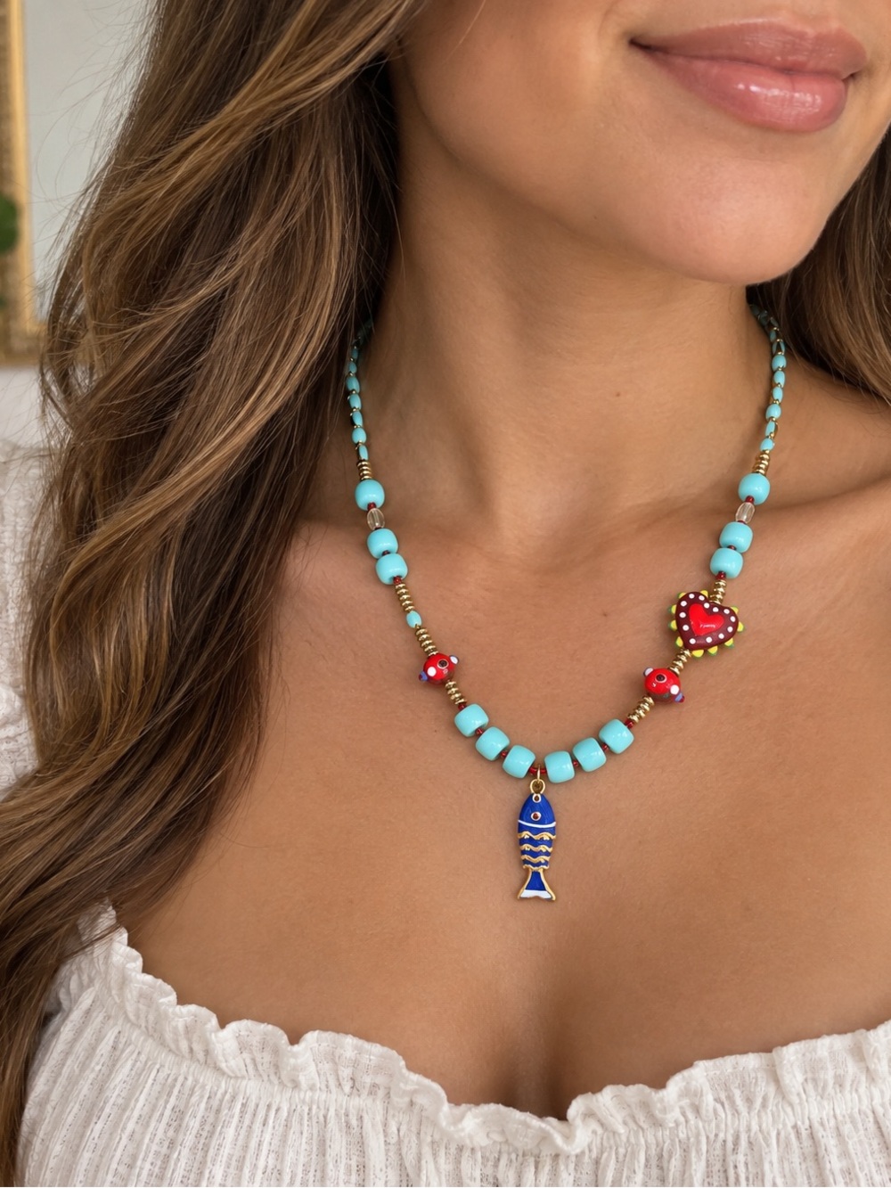 Turquoise Bead Necklace with Red Accents and Blue Fish Charm